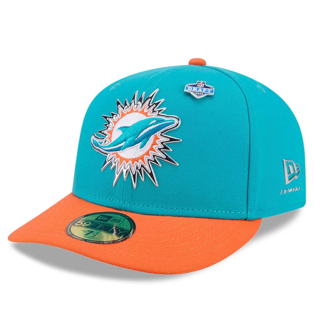 Miami Dolphins NFL Draft 2026 Turquoise New Era 59FIFTY Fitted Cap, three-quarter view showing the raised embroidered Dolphins logo on the front panel, orange flat visor with gold 59FIFTY size sticker, and a 2026 NFL Draft badge above the logo.