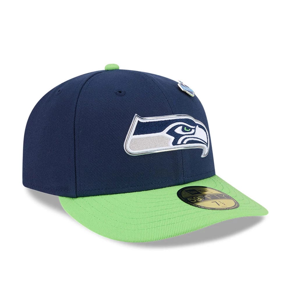 Seattle Seahawks NFL Draft 2026 Dark Blue New Era 59FIFTY Fitted Cap, three-quarter view showing the white and blue embroidered Seahawks logo on the front panel, with a bright green visor and a gold 59FIFTY size sticker on the top.