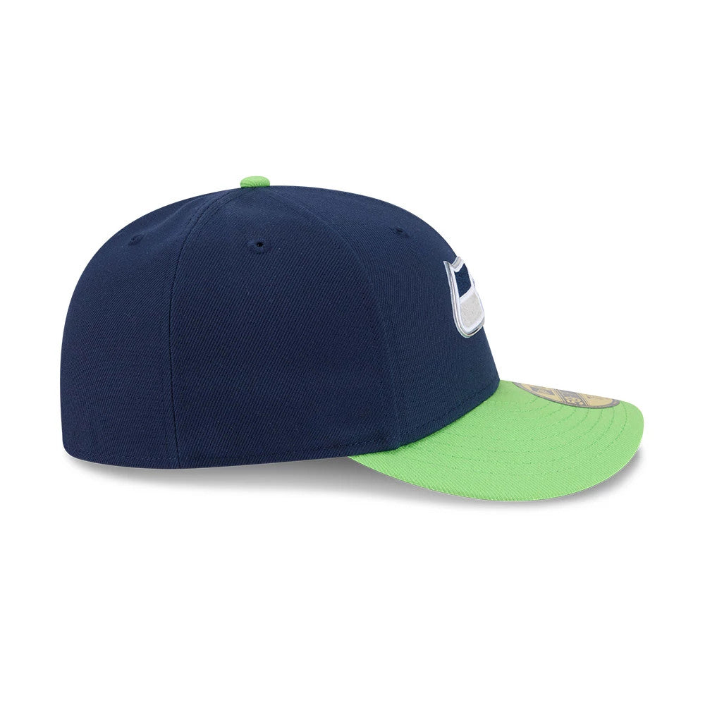 Seattle Seahawks NFL Draft 2026 Dark Blue New Era 59FIFTY Fitted Cap, side view showing the raised white embroidered Seahawks logo on the dark blue structured crown, with a contrasting green visor and a gold size sticker on the top.