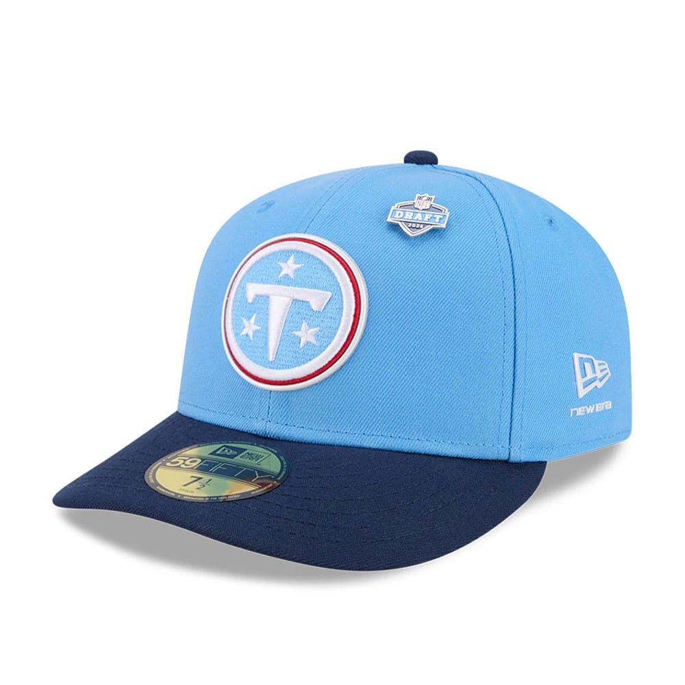 Tennessee Titans NFL Draft 2026 Blue New Era 59FIFTY Fitted Cap, front view showing raised embroidered Titans logo on blue crown with a navy flat visor, accompanied by an NFL Draft 2026 pin and silver New Era flag logo on the left side.