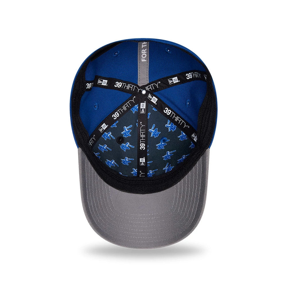 Indianapolis Colts NFL Draft 2026 Blue New Era 39THIRTY M-Crown Stretch Fit Cap, inside view showing Colts helmet graphics on the black undervisor, grey taping with New Era logos, and a blue sweatband.