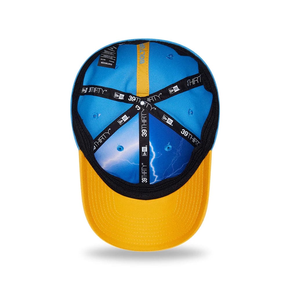 LA Chargers NFL Draft 2026 Blue New Era 39THIRTY M-Crown Stretch Fit Cap, inside view featuring a yellow undervisor, patterned blue interior panels with lightning graphics, and black 39THIRTY branded taping crossing the structured crown.