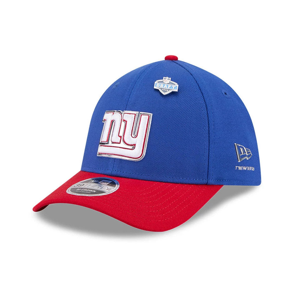 New York Giants NFL Draft 2026 Blue New Era 39THIRTY M-Crown Stretch Fit Cap, three-quarter view showing the raised embroidered white and red ny logo on the front panel, with a contrasting red visor and a curved blue crown.