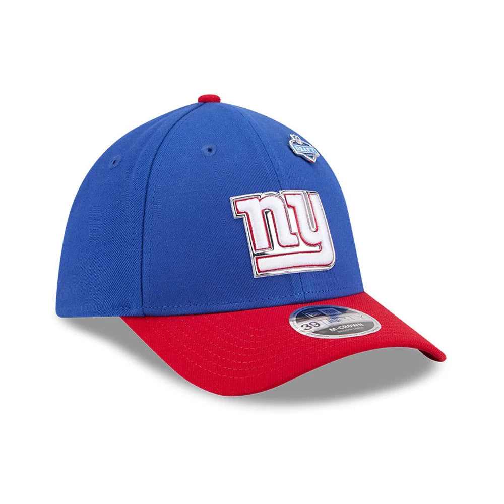 New York Giants NFL Draft 2026 Blue New Era 39THIRTY M-Crown Stretch Fit Cap, three-quarter view showing the raised white and red embroidered NY logo on the front panel, with a red curved visor and a 39THIRTY size sticker.