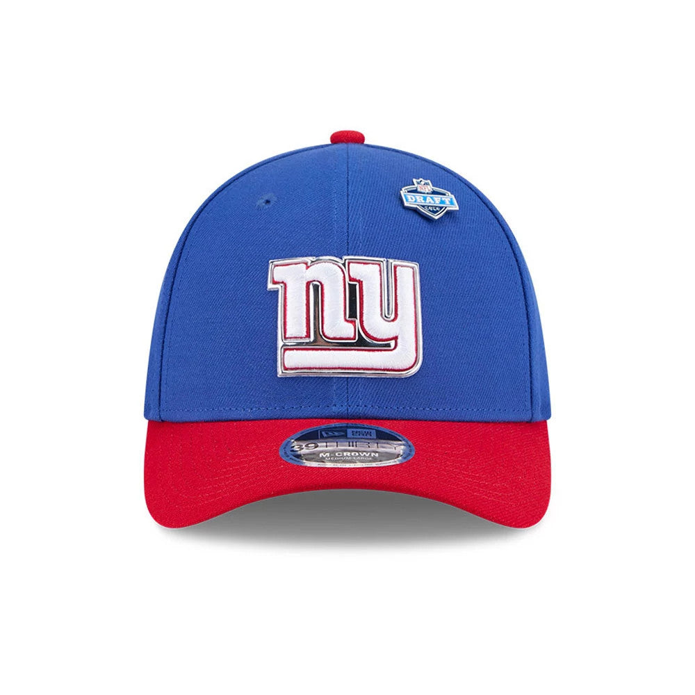 New York Giants NFL Draft 2026 Blue New Era 39THIRTY M-Crown Stretch Fit Cap, front view showing the raised red and white embroidered ny logo on the blue front panel, red flat visor, and 39THIRTY size sticker.