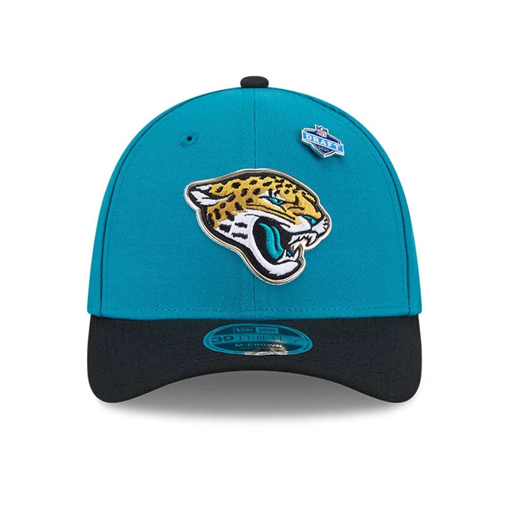 Jaguars NFL Draft 2026 Turquoise New Era 39THIRTY M-Crown Stretch Fit Cap, front view showing a prominently embroidered Jaguars logo on the turquoise crown, black curved visor, and 39THIRTY size sticker on the visor.