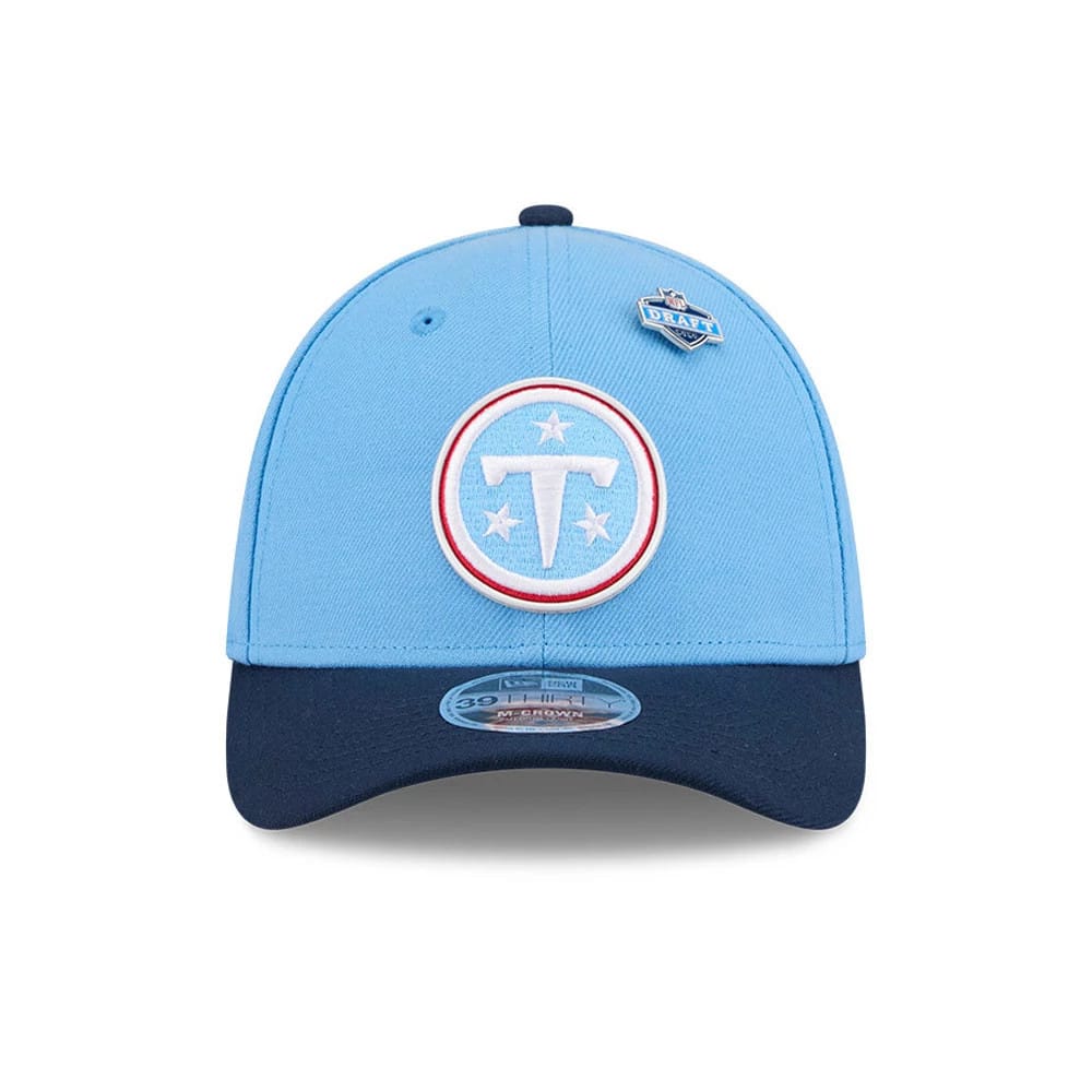 Tennessee Titans NFL Draft 2026 Dark Blue New Era 39THIRTY M-Crown Stretch Fit Cap, front view showing the raised Titans logo embroidered in white and red with three stars, blue crown and dark blue visor with a 39THIRTY size sticker on the visor.