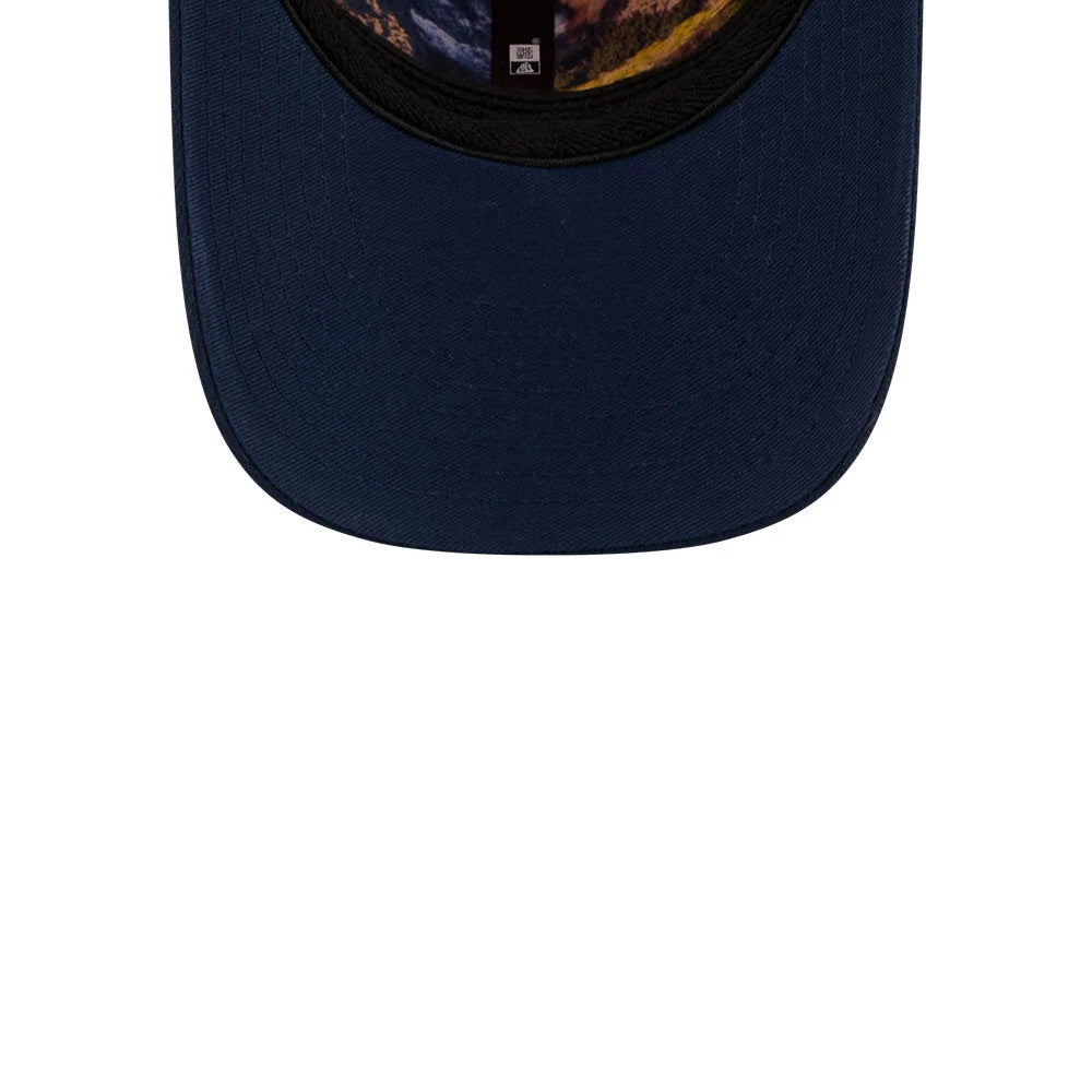Broncos NFL Draft 2026 Orange New Era 39THIRTY M-Crown Stretch Fit Cap, inside view featuring a navy undervisor, black sweatband, and an interior seam with a small label displaying the New Era flag logo.
