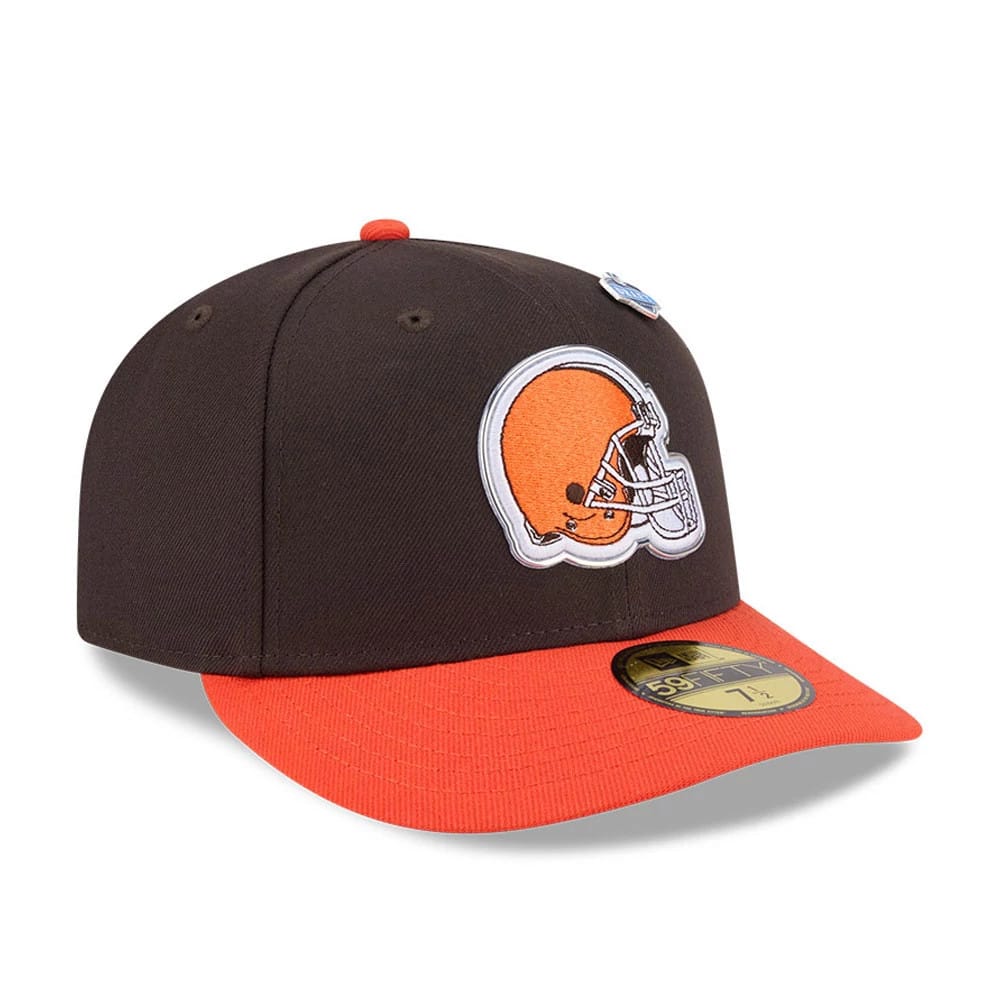 Cleveland Browns NFL Draft 2026 Dark Brown New Era 59FIFTY Fitted Cap, three-quarter view showing the orange embroidered helmet logo on the front panel, an orange visor with a gold 59FIFTY size sticker, and a red top button.