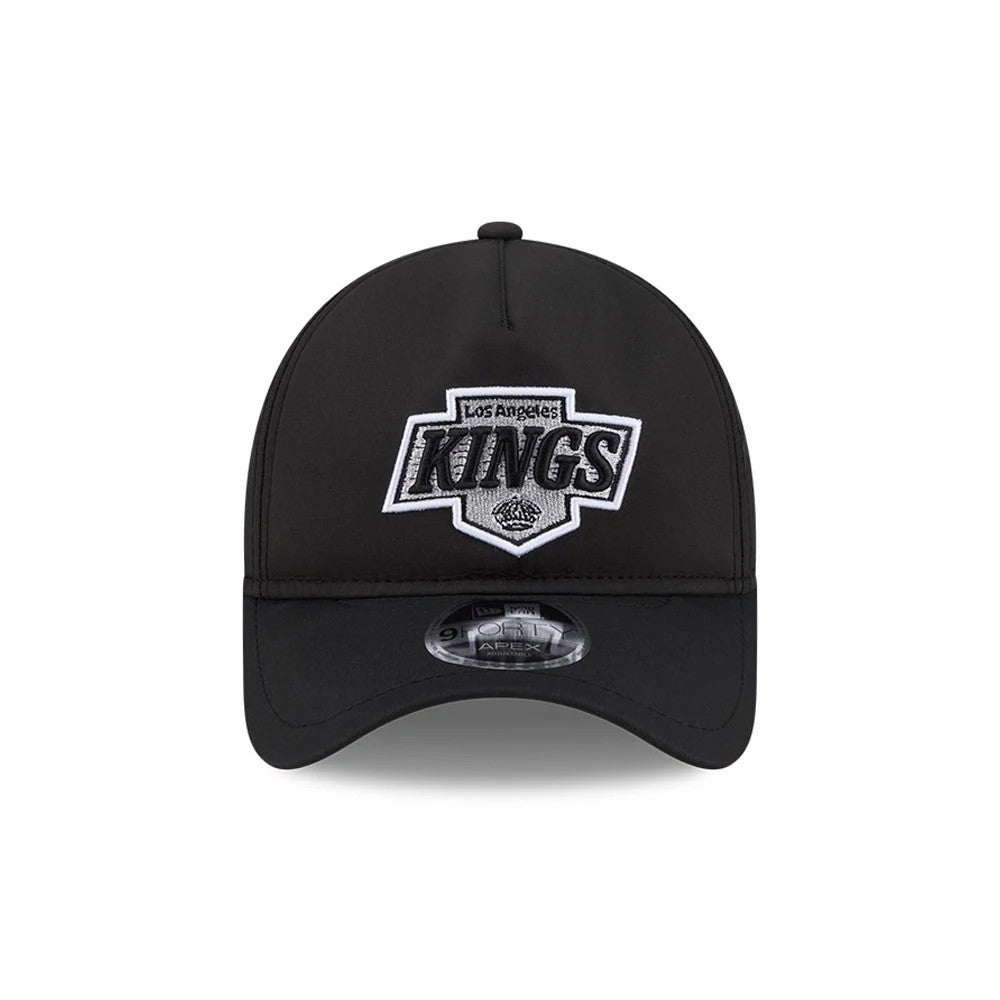 Los Angeles Kings NHL Quickstrike Black New Era 9FORTY Apex Adjustable Cap, front view showing the raised embroidered Kings logo on the black front panel, with a matching black curved visor and a 9FORTY size sticker on top.