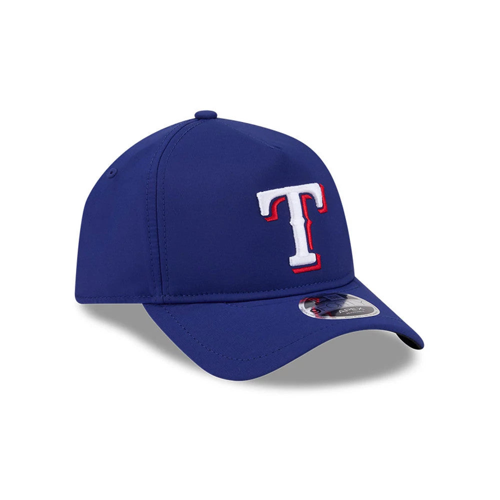 Texas Rangers MLB Quickstrike Dark Blue New Era 9FORTY Apex Adjustable Cap, front view showing a raised white and red embroidered T logo on the front panel, with a curved visor adorned with a 9FORTY size sticker.
