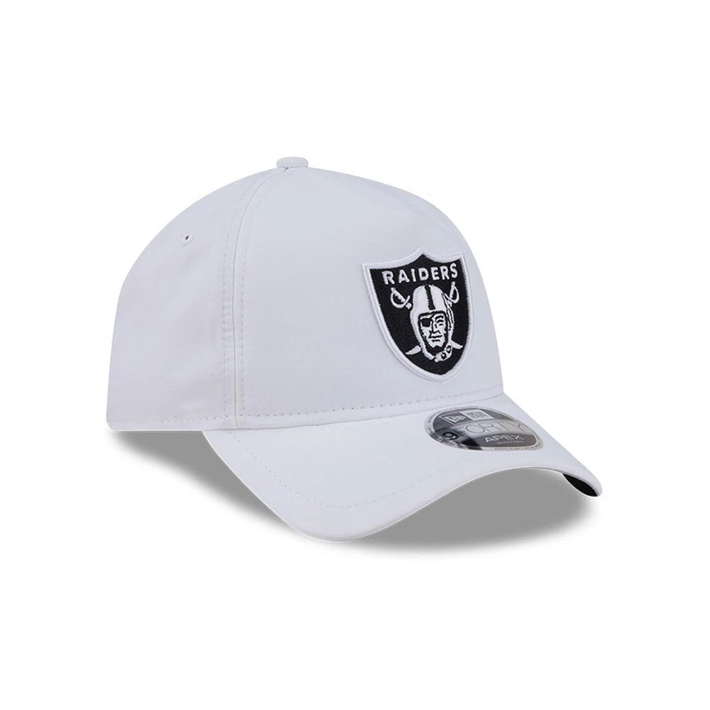 Las Vegas Raiders NFL Quickstrike White New Era 9FORTY Apex Adjustable Cap, three-quarter view showing the raised embroidery of the black and white Raiders logo on the structured white crown, with an arched visor and 9FORTY size sticker.