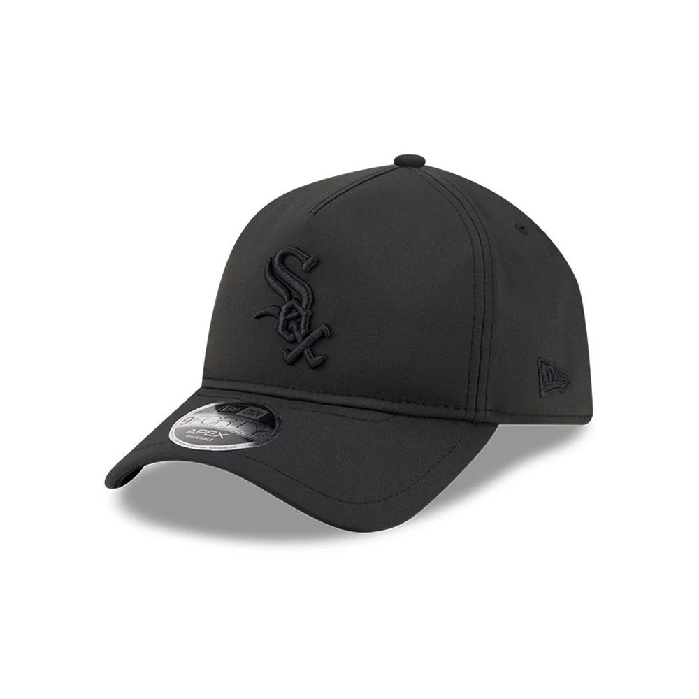 White Sox MLB Quickstrike Black on Black New Era 9FORTY Apex Adjustable Cap, front view showing the raised black embroidered Sox logo on the front panel, a curved black visor with a 9FORTY size sticker, and a structured black crown.