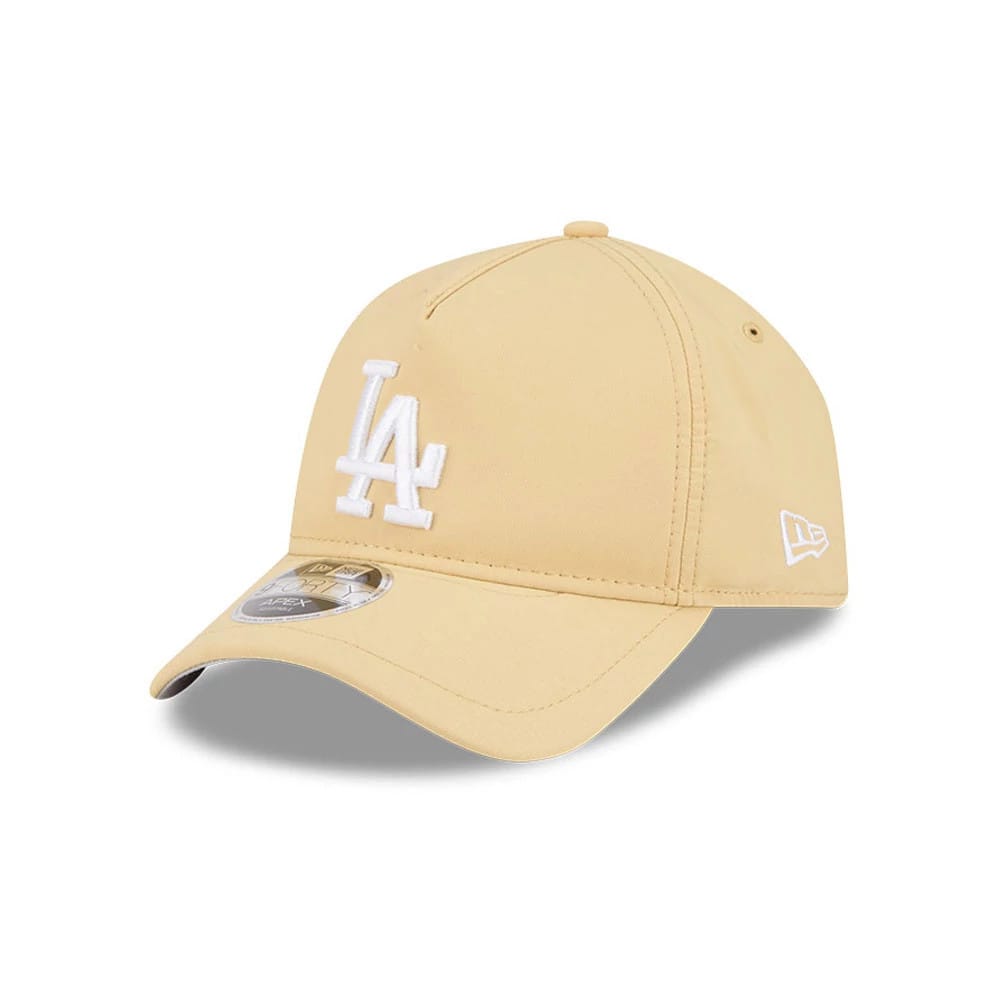 LA Dodgers MLB Quickstrike Yellow New Era 9FORTY Apex Adjustable Cap, three-quarter view showing the white raised LA embroidery on the front panel, curved yellow visor with a 9FORTY size sticker, and the New Era flag logo on the left side.