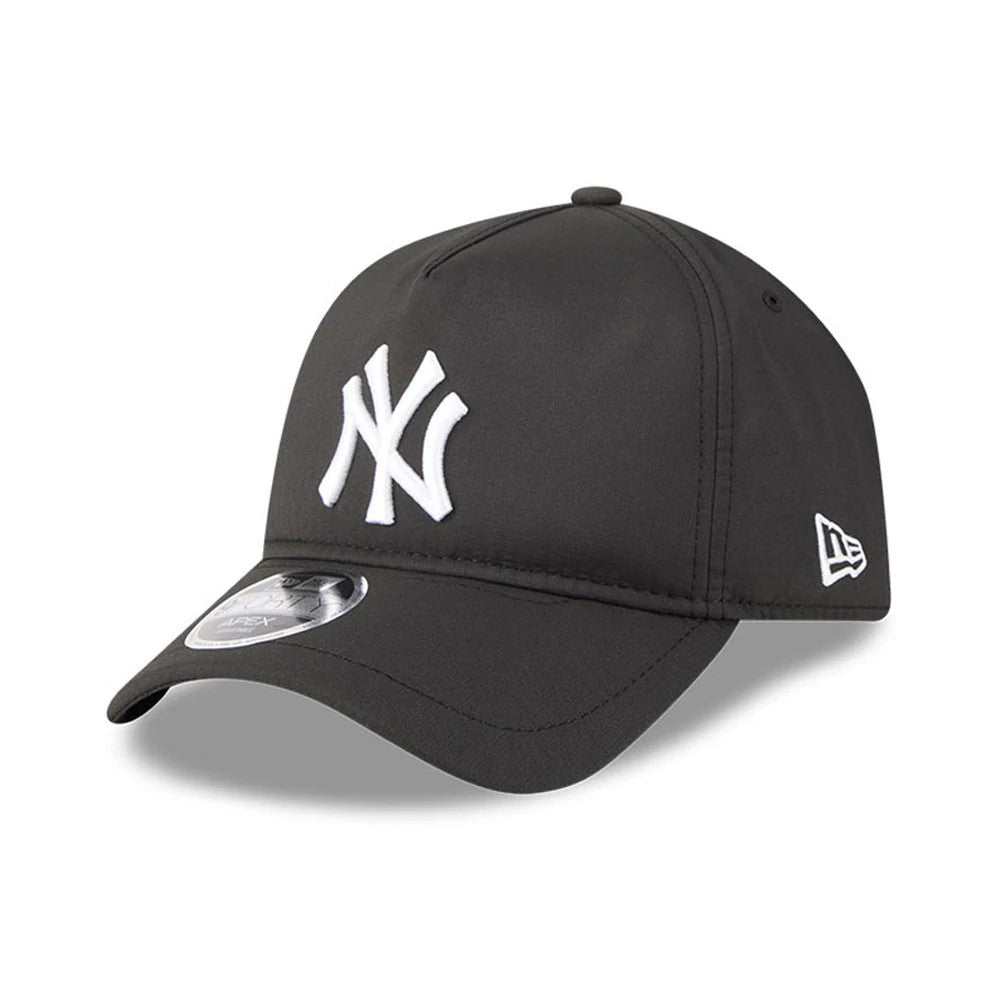 New York Yankees MLB Quickstrike Core Black New Era 9FORTY Apex Adjustable Cap, three-quarter view showing the raised white NY logo on the front panel, a curved black visor with a 9FORTY size sticker, and the New Era flag logo on the left side.