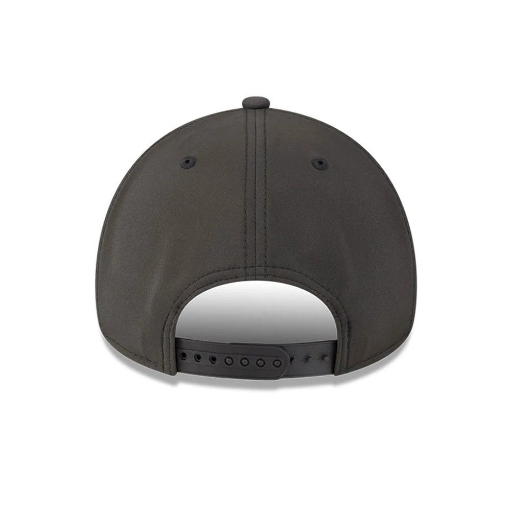 LA Dodgers MLB Quickstrike Core Black New Era 9FORTY Apex Adjustable Cap, rear view showing the black adjustable strap with multiple notches, two black embroidered eyelets on the back panels, and a matching black top button on the structured crown.