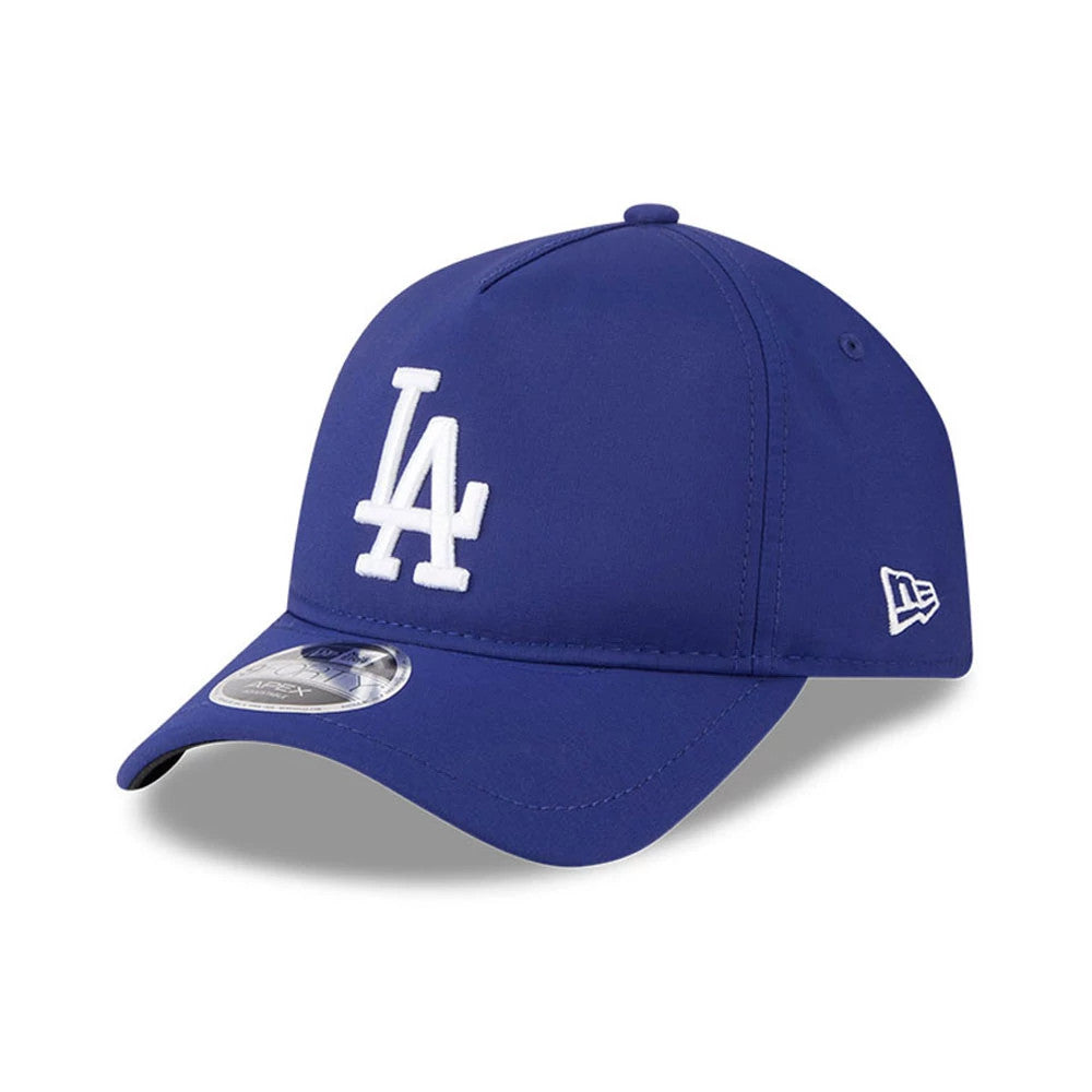 LA Dodgers MLB Quickstrike Dark Blue New Era 9FORTY Apex Adjustable Cap, three-quarter view showing raised white LA logo on the front panel, dark blue curved visor with a 9FORTY size sticker, and white New Era flag logo on the left side.