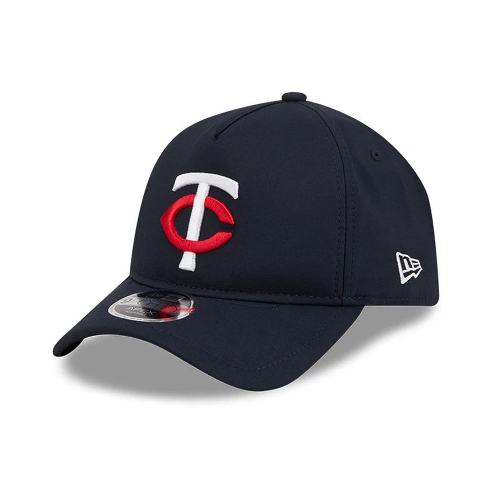 Minnesota Twins MLB Quickstrike Navy New Era 9FORTY Apex Adjustable Cap, three-quarter view showing the raised embroidered TC logo in white and red on the front panel, with a curved navy visor and 9FORTY size sticker.