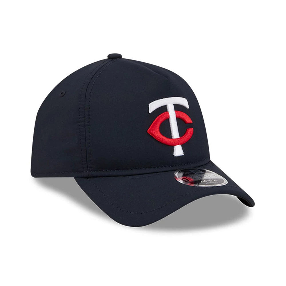 Minnesota Twins MLB Quickstrike Navy New Era 9FORTY Apex Adjustable Cap, three-quarter view showing the raised embroidered white and red TC logo on the front panel, with a bent navy visor and the 9FORTY size sticker on the visor.
