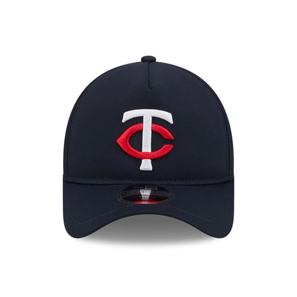 Minnesota Twins MLB Quickstrike Navy New Era 9FORTY Apex Adjustable Cap, front view showing white and red embroidered TC logo on the structured navy crown, curved visor with 9FORTY size sticker underneath, and top button accent.