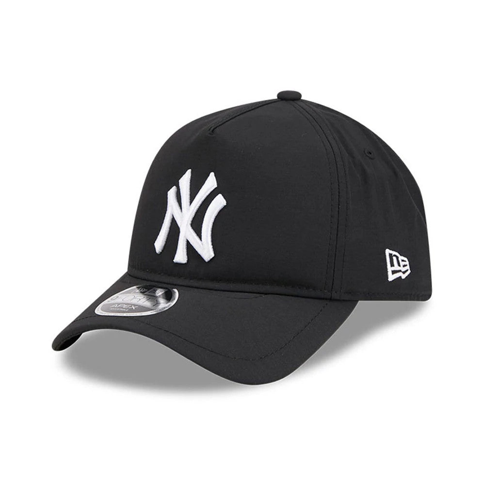 Yankees MLB Quickstrike Black New Era 9FORTY Apex Adjustable Cap, three-quarter view showing the white raised embroidered NY logo on the front panel, a New Era flag logo on the left side, and a 9FORTY size sticker on the curved visor.