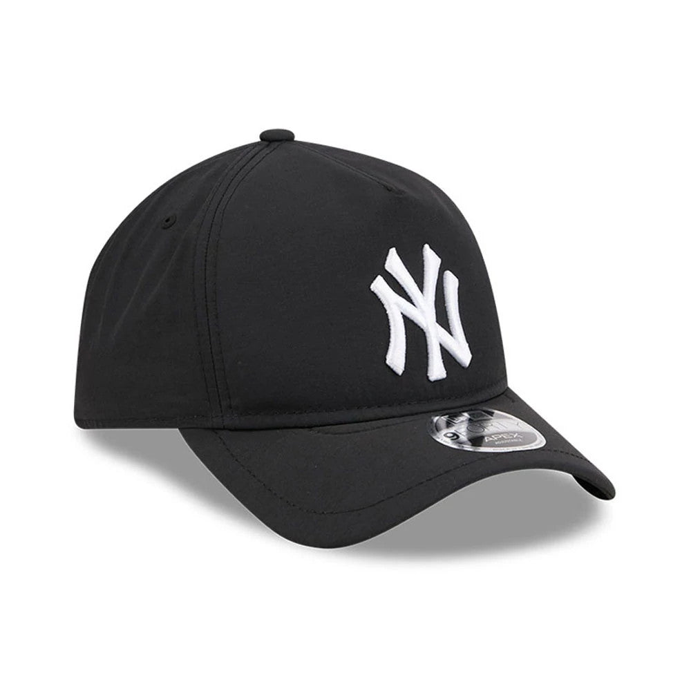 Yankees MLB Quickstrike Black New Era 9FORTY Apex Adjustable Cap, three-quarter view showing a raised white NY logo embroidered on the front panel, with a black curved visor featuring a 9FORTY size sticker.