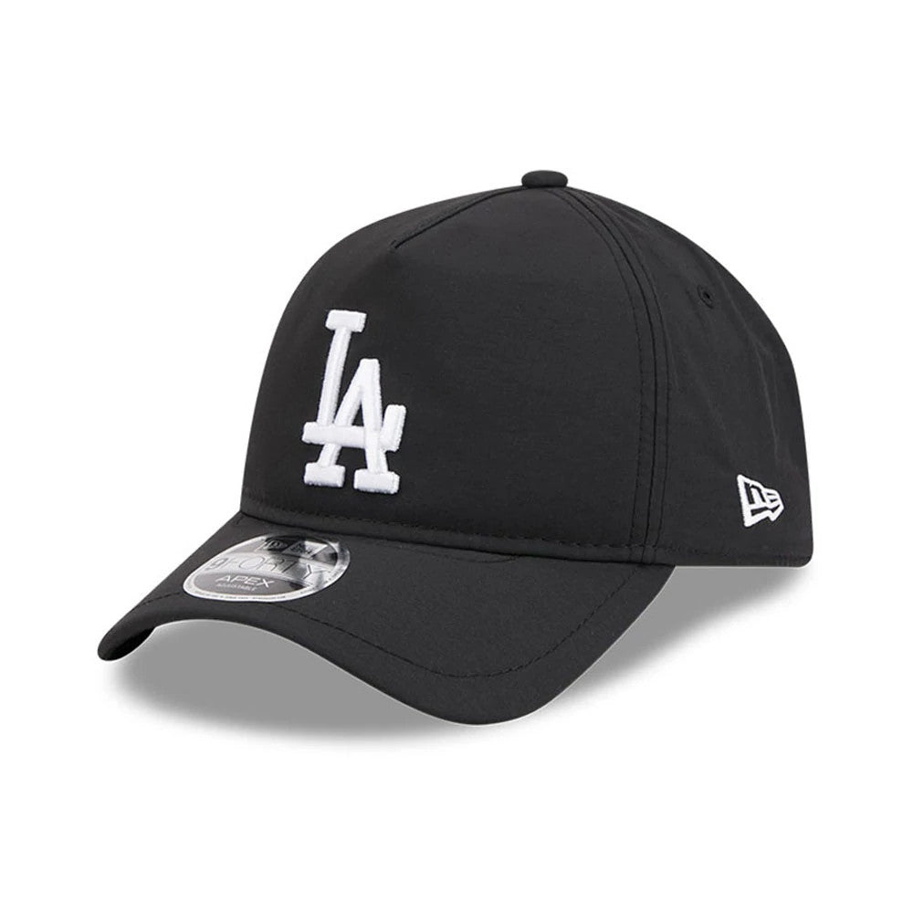 Dodgers MLB Quickstrike Black New Era 9FORTY Apex Adjustable Cap, three-quarter view with a white embroidered LA logo on the front panel, a curved black visor featuring a 9FORTY size sticker, and the New Era flag logo on the left side.