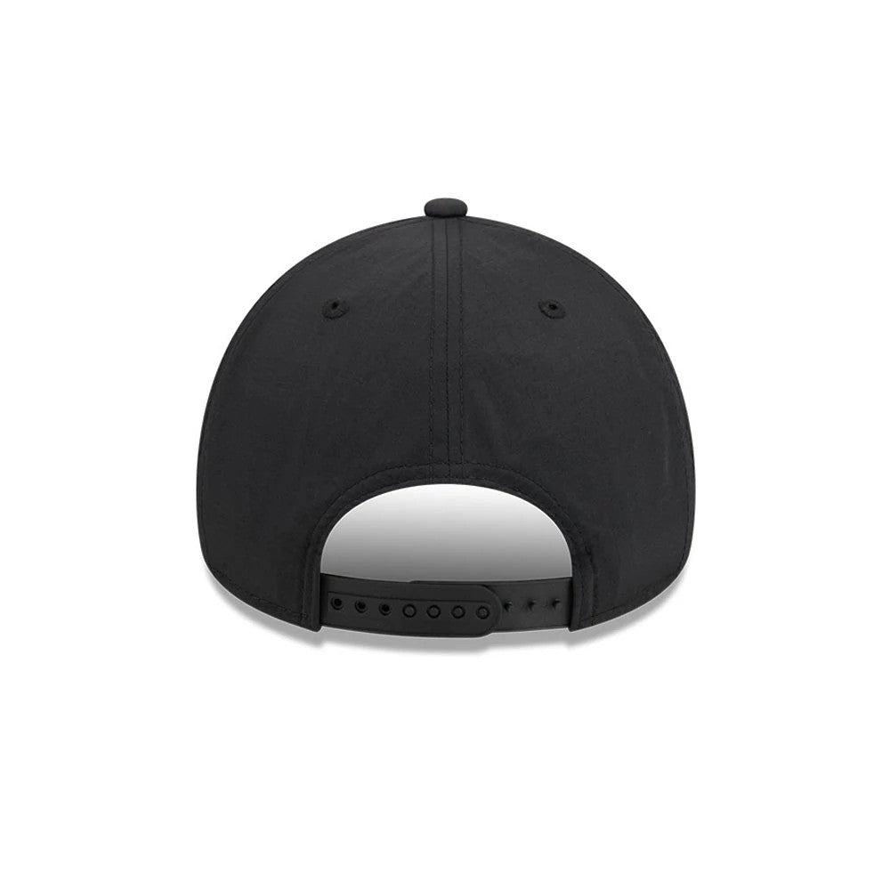 Bulls NBA Quickstrike Black New Era 9FORTY Apex Adjustable Cap, rear view showing the black adjustable strap for a custom fit, two small black eyelets on each back panel, and a matching top button on the structured black crown.