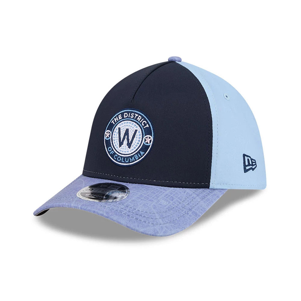 Nationals MLB City Connect Navy New Era 39THIRTY M-Crown A-Frame Stretch Fit Cap, three-quarter view showing the circular embroidered The District of Columbia logo on the front panel, sky blue visor with a 39THIRTY size sticker.