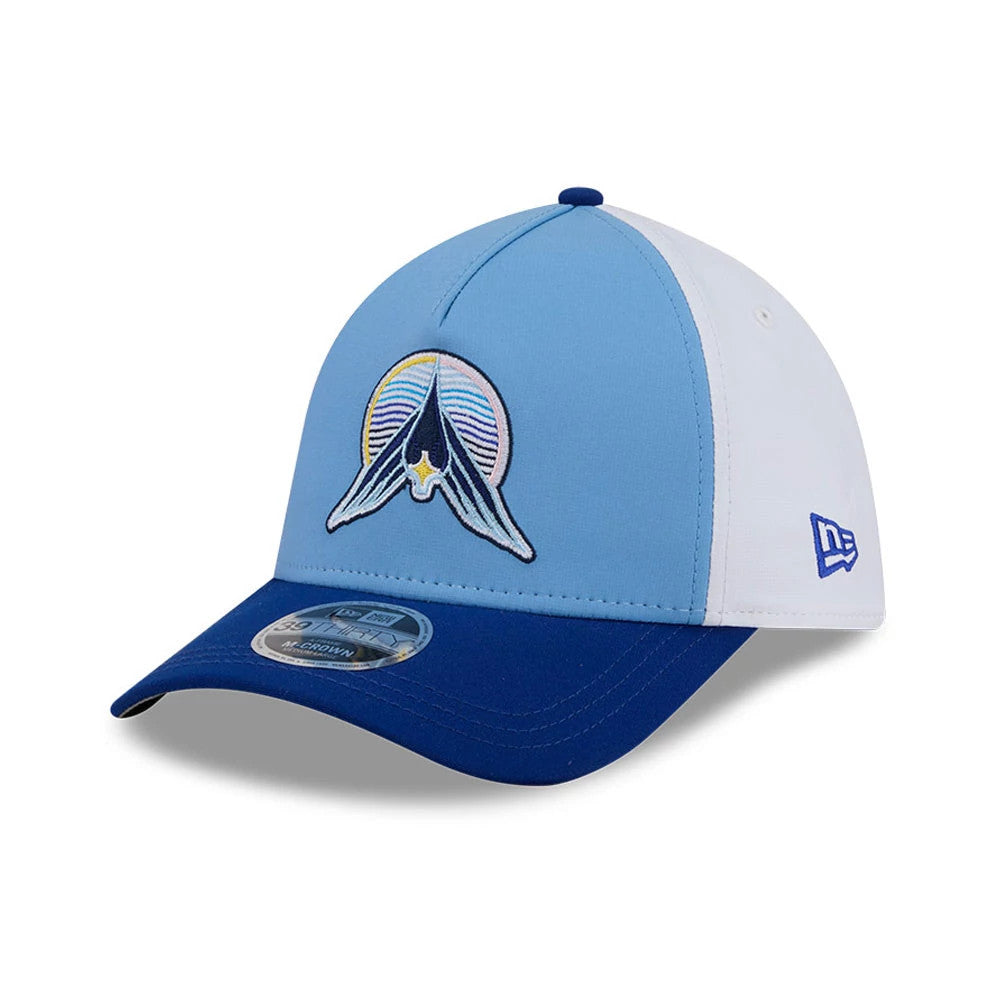 Twins MLB City Connect Blue New Era 39THIRTY M-Crown A-Frame Stretch Fit Cap, three-quarter view showing a multicoloured front logo embroidered on a light blue front panel, contrasting with white side panels.