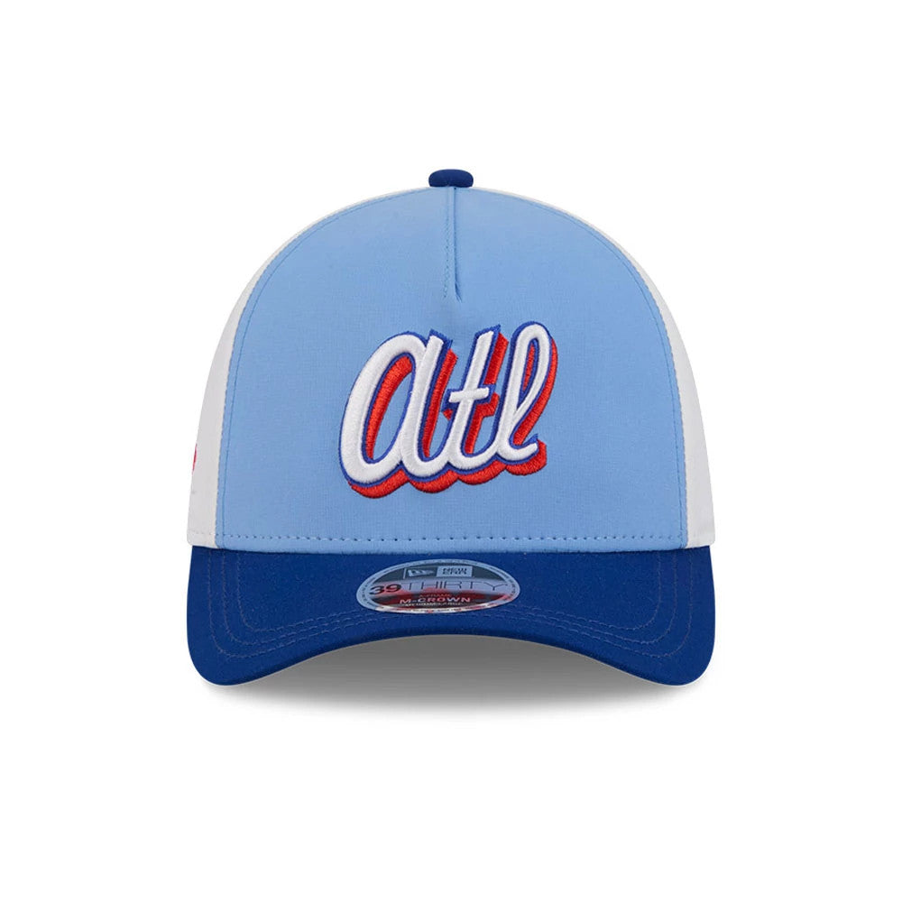 Braves MLB City Connect Blue New Era 39THIRTY M-Crown A-Frame Stretch Fit Cap, front view showing the raised embroidered atl lettering in white, red, and navy on a light blue crown, with a dark blue curved visor and a 39THIRTY size sticker.