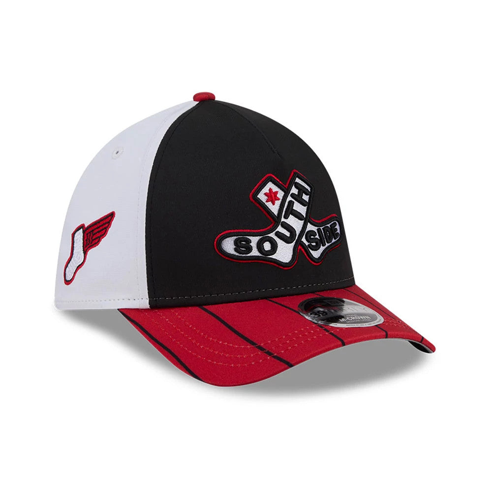 White Sox MLB City Connect Black New Era 39THIRTY M-Crown A-Frame Stretch Fit Cap, three-quarter view showing the South Side logo in red and white embroidery on the front panel, a red visor with black pinstripes, and a 39THIRTY size sticker.