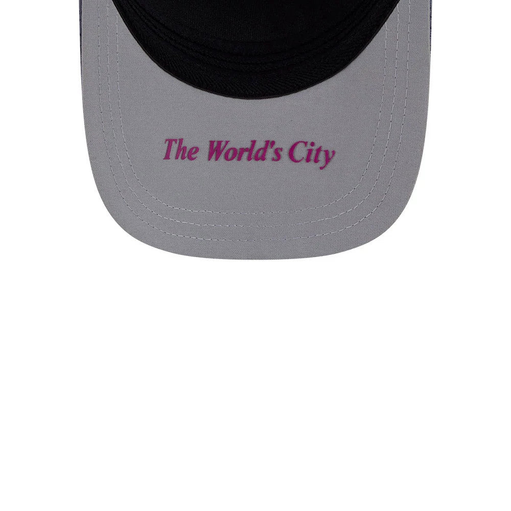Mets MLB City Connect Black New Era 39THIRTY M-Crown A-Frame Stretch Fit Cap, underside view showing The World's City text in purple embroidery on the grey undervisor, with seam stitching along the edge.