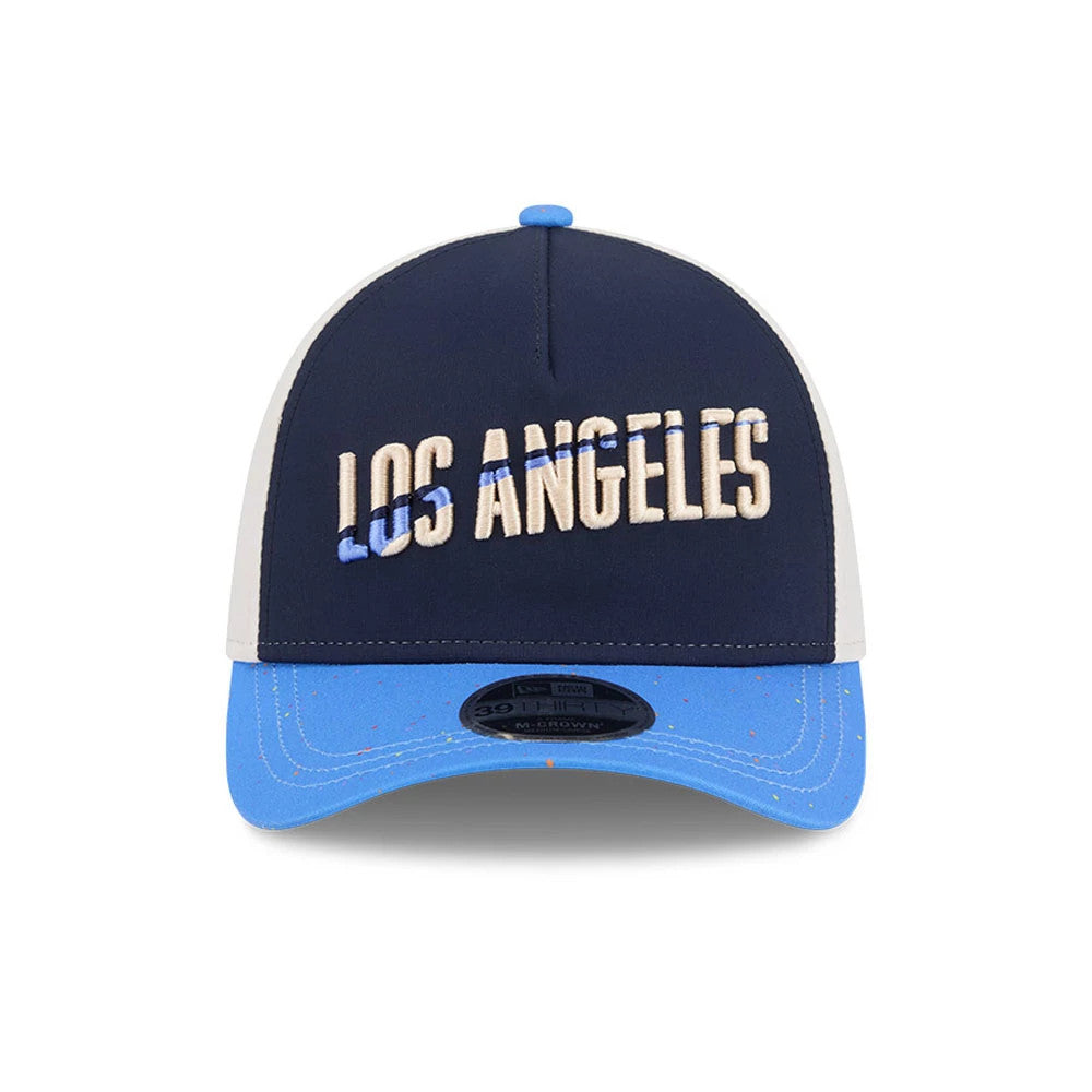 Dodgers MLB City Connect Navy New Era 39THIRTY M-Crown A-Frame Stretch Fit Cap, front view showing the raised embroidered Los Angeles lettering in cream and blue on the navy front panel, with a light blue visor featuring fleck details.