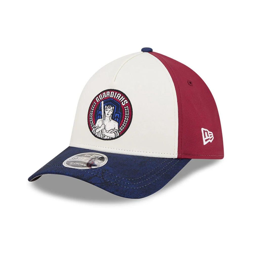 Guardians MLB City Connect White New Era 39THIRTY M-Crown A-Frame Stretch Fit Cap, three-quarter view showing the Guardians logo in embroidery on the front panel, with a dark blue visor and the New Era flag logo on the maroon side panel.