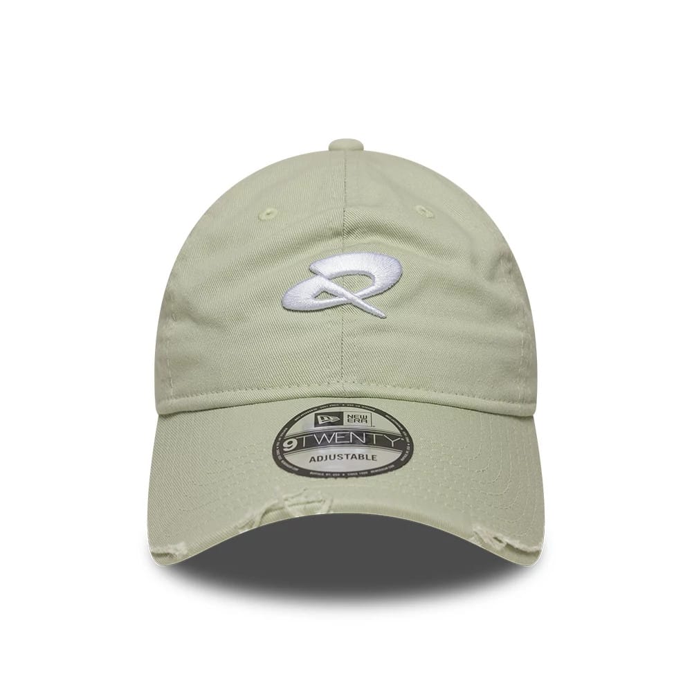 Quadrant X New Era Distressed Pastel Green 9TWENTY Cap, front view showing a white embroidered logo on the structured crown, a slightly curved visor with a 9TWENTY size sticker, and distressing details along the visor edge.