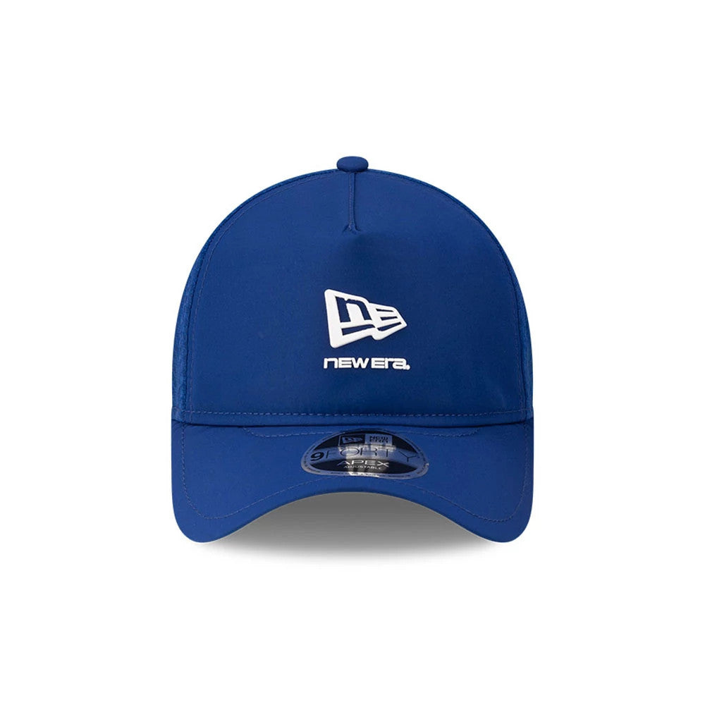 New Era Blue 9FORTY Apex Cap, front view showing white New Era flag logo in raised embroidery on the structured blue crown, matching curved visor, and clear 9FORTY size sticker placed on the centre of the visor.