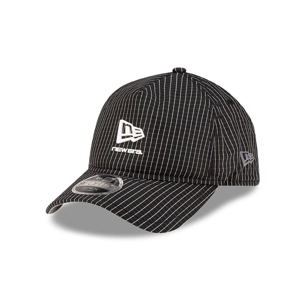 New Era Ripstop Black New Era 9FORTY Apex Cap, three-quarter view showing the white New Era flag logo on the black and white pinstriped front panel, complemented by a curved visor with a 9FORTY size sticker and matching side embroidery.