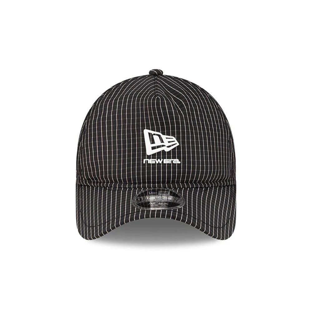 New Era Ripstop Black New Era 9FORTY Apex Cap, front view showing the white embroidered New Era flag logo on the front panel, contrasting against the black ripstop fabric with gridlines, and a clear 9FORTY size sticker on the curved visor.
