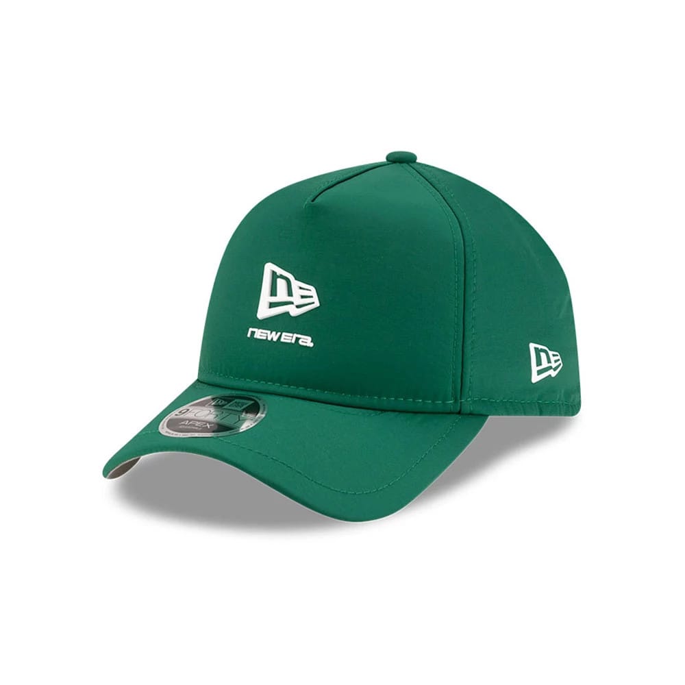 New Era Dark Green 9FORTY Apex Cap, three-quarter view showing the large white embroidered New Era logo on the front panel, a matching logo on the left side, and a 9FORTY size sticker on the curved visor.