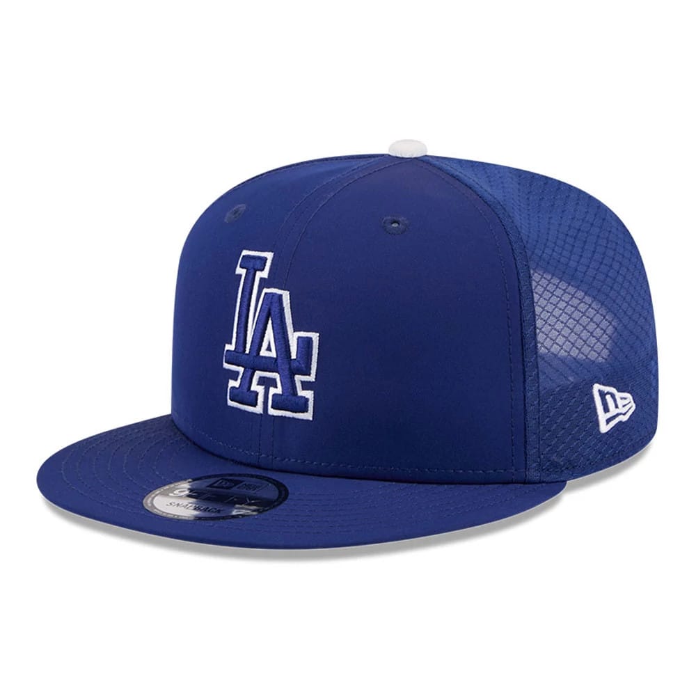 LA Dodgers MLB Batting Practice 2026 Dark Blue New Era 9FIFTY Snapback Adjustable Cap, three-quarter view showing the white embroidered LA logo on the structured dark blue crown, mesh side panel, and a 9FIFTY size sticker on the flat blue visor.