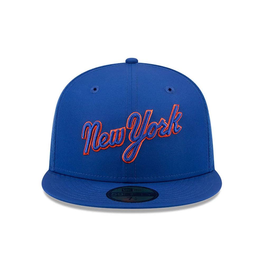 New York Mets MLB Batting Practice 2026 Blue New Era 59FIFTY Fitted Cap, front view showing raised blue New York lettering outlined in orange on the blue front panel, with a matching blue visor and a 59FIFTY size sticker on the visor.