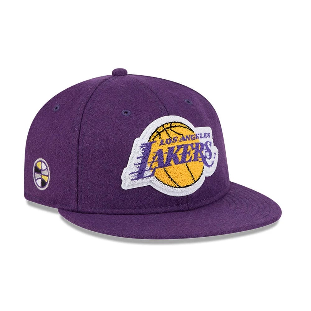 Pictured is this NBA Chenille Woven LA Lakers Retro Crown 9FIFTY cap in purple. 1