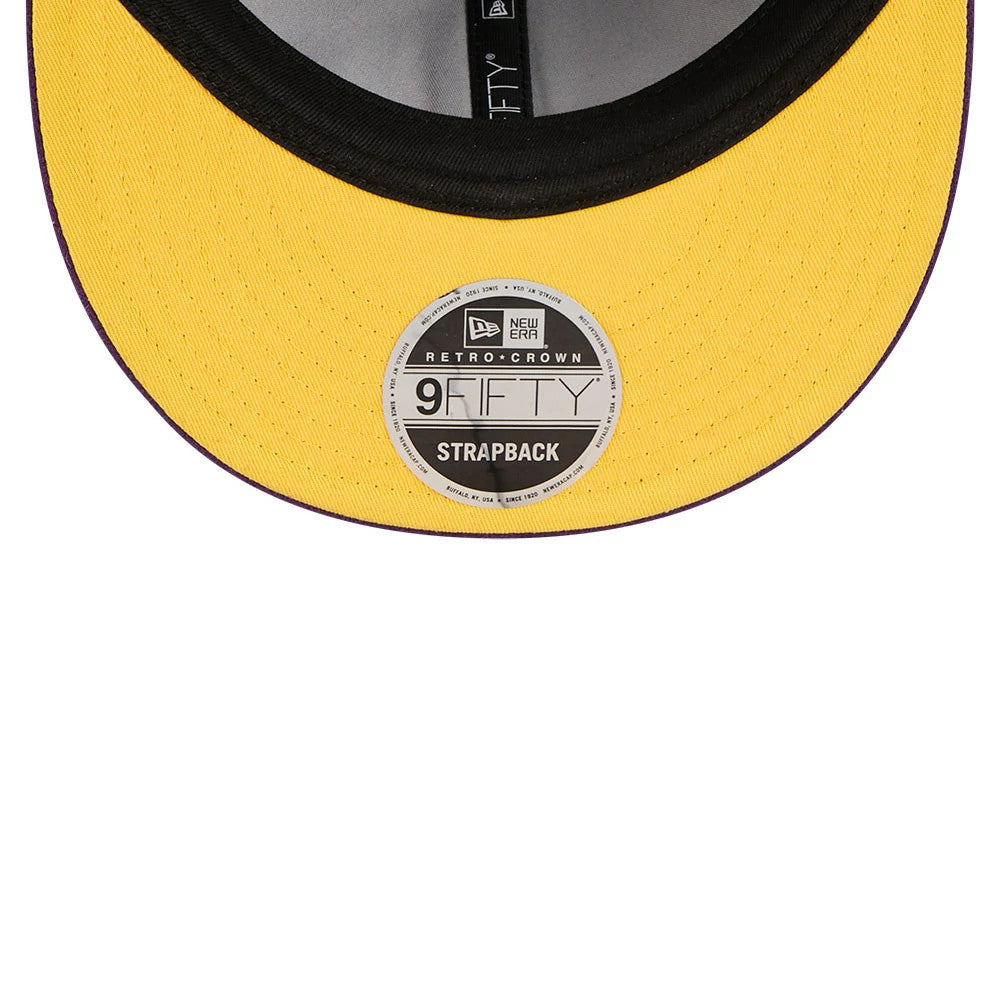 LA Lakers NBA Chenille Woven Purple Retro Crown New Era 9FIFTY Adjustable Cap, inside view showing a yellow undervisor, a contrasting black sweatband, and a grey taping with the 9FIFTY size sticker placed centrally on the underside.