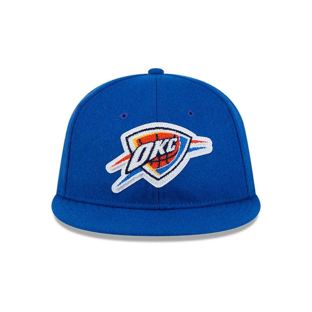 Oklahoma City Thunder NBA Chenille Woven Blue Retro Crown New Era 9FIFTY Cap, front view showing a raised team logo embroidered in white, orange, and blue on the structured blue crown, with eyelets and a matching blue visor.