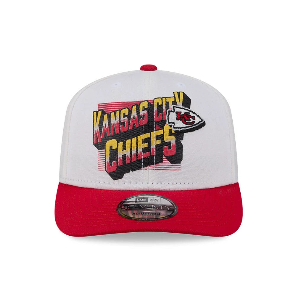 Kansas City Chiefs NFL Duck Cloth White New Era 9SEVENTY Stretch Snap Cap, front view showing large, raised Kansas City Chiefs logo in yellow and red embroidery on white front panel, red curved visor with 9SEVENTY size sticker in the centre.