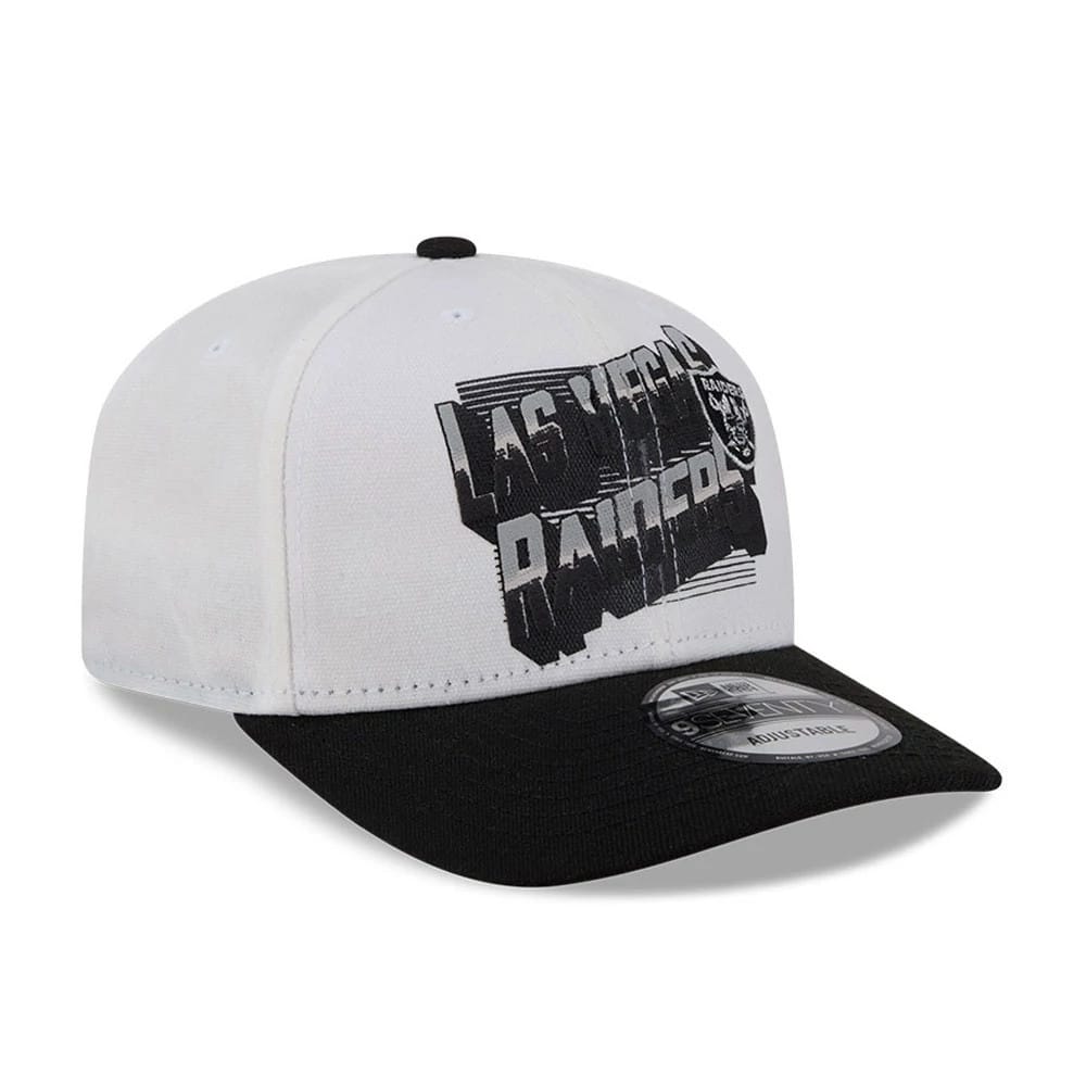 Las Vegas Raiders NFL Duck Cloth White New Era 9SEVENTY Stretch Snap Cap, three-quarter view showing the black and grey Las Vegas Raiders lettering with a Raiders crest on the front panels, black visor, and 9SEVENTY size sticker.