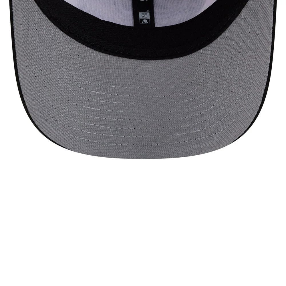 Las Vegas Raiders NFL Duck Cloth White New Era 9SEVENTY Stretch Snap Cap, inside view showing the grey undervisor, black elastic New Era logo taping along the crown seams, and the black sweatband with contrasting white stitching detail.