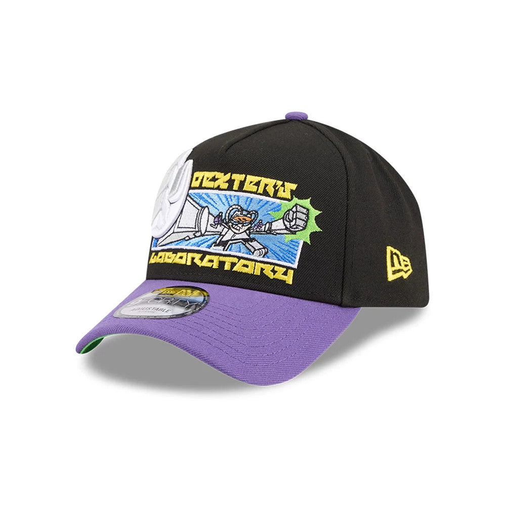 Dexter's Laboratory Dex-Transformer Black New Era 9FORTY A-Frame Cap, three-quarter view showing a colourful embroidered Dexter graphic on the front panel, lavender visor with a grey undervisor, and a yellow New Era flag logo on the left side.