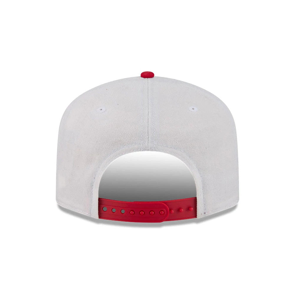 Kansas City Chiefs NFL Duck Cloth White New Era 19TWENTY Adjustable Cap, rear view showing a red adjustable strap contrasting against the white fabric, with a red top button and two white embroidered eyelets on the crown.
